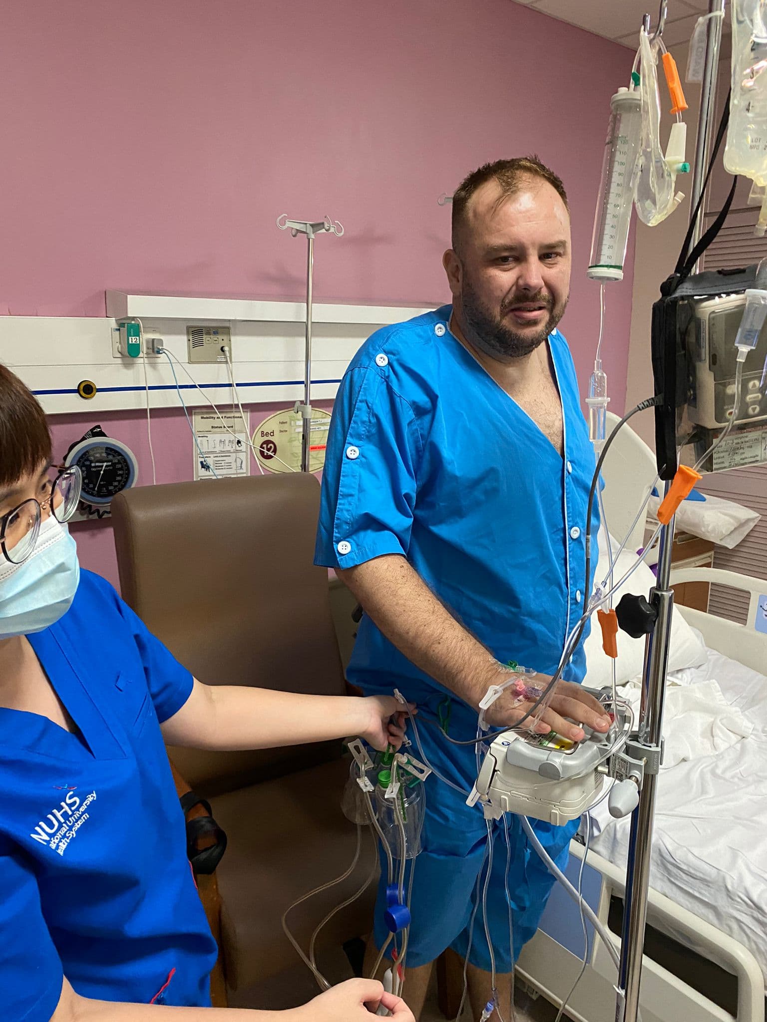 Tim in hospital after surgery during a difficult stage of recovery